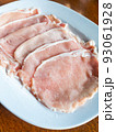 Freshness pork slices on dish. 93061928