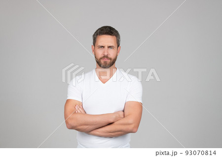The man who has confidence in himself. Confident man grey background. Serious guy keep arms crossed The man who has confidence in himself. Confident man grey background. Serious guy keep arms crossed 93070814
