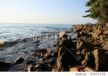 View of the seascape from the coast off Rabbit Island or Koh Tonsai in Kep, Cambodia View of the seascape from the coast off Rabbit Island or Koh Tonsai in Kep, Cambodia 93073158