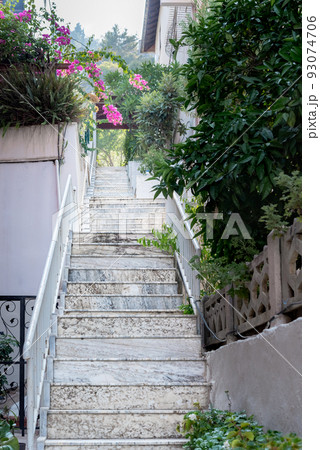Empty stone staircase leading to the house. Empty stone staircase leading to the house. 93074706
