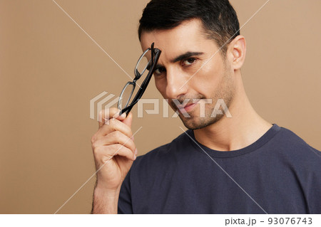 portrait man gray t-shirt glasses cropped view emotions cropped view 93076743