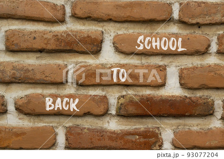 Back to school and support symbol. Concept words Back to school on red brick wall. Beautiful red brick wall background. Business, educational and Back to school quote concept. Copy space. Back to school and support symbol. Concept words Back to school on red brick wall. Beautiful red brick wall background. Business, educational and Back to school quote concept. Copy space. 93077204