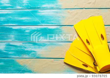 fins lying on the wooden boards 93078705