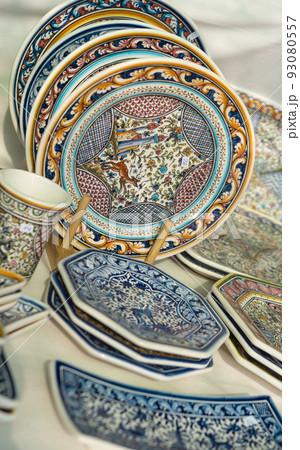 Stall with colorful Portuguese ceramics Stall with colorful Portuguese ceramics 93080557