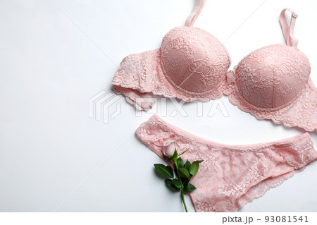 Elegant women's underwear and rose flower on white background, flat lay 93081541