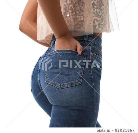 Woman wearing jeans on white background, closeup Woman wearing jeans on white background, closeup 93081967