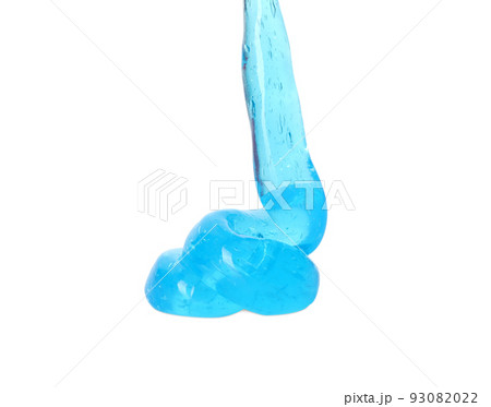 Flowing light blue slime on white background. Antistress toy Flowing light blue slime on white background. Antistress toy 93082022