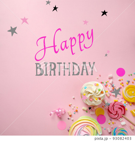 Flat lay composition with confectionery on pink background. Happy Birthday 93082403