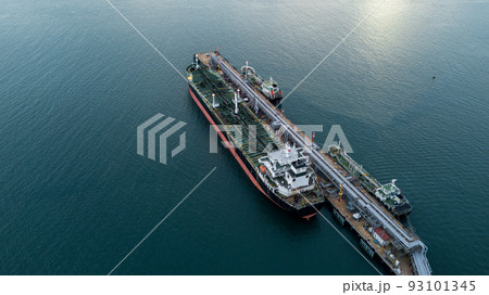 Aerial view tanker ship vessel unloading at port, Global business logistic import export oil and gas petrochemical with tanker ship transportation oil from dock refinery. 93101345