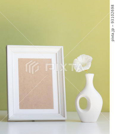 product mock up with white frame with space for text and white vase product mock up with white frame with space for text and white vase 93102698