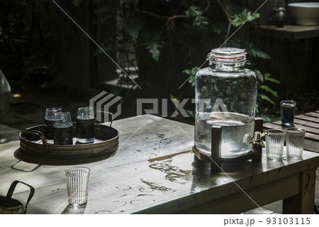Glass jar with water and a glass of water placed in Ruen Thai, Glass jar with water and a glass of water placed in Ruen Thai, 93103115