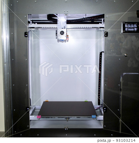 Empty 3d printer close-up. 3d printer with empty desktop inside. Non-printing open 3dprinter. Cope space. Progressive additive modern 3D printing technology. High-precision 3D printing technologies Empty 3d printer close-up. 3d printer with empty desktop inside. Non-printing open 3dprinter. Cope space. Progressive additive modern 3D printing technology. High-precision 3D printing technologies 93103214