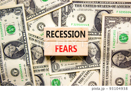 Recession fears symbol. Concept words Recession fears on wooden blocks on a beautiful background from dollar bills. Business and recession fears concept. Copy space. Recession fears symbol. Concept words Recession fears on wooden blocks on a beautiful background from dollar bills. Business and recession fears concept. Copy space. 93104938