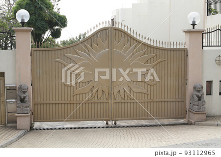 a Golden door gate , with sun pattern a Golden door gate , with sun pattern 93112965