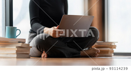 Young woman with working online on laptop computer. studying or working from home online concept. Young woman with working online on laptop computer. studying or working from home online concept. 93114239