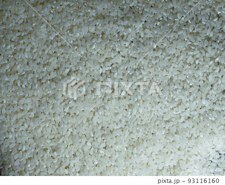 White round grain close up rice full frame background. Indian cuisine ingredients 93116160