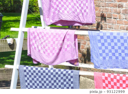 Laundry day, old dutch laudry rack with fresh laundry Laundry day, old dutch laudry rack with fresh laundry 93122999