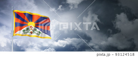Tibetan flag on a cloudy sky Tibetan flag on a cloudy sky 93124518