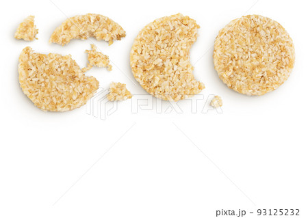 coconut cookies with white flax seeds and honey isolated on white background. Healthy food. Top view with copy space for your text. Flat lay coconut cookies with white flax seeds and honey isolated on white background. Healthy food. Top view with copy space for your text. Flat lay 93125232