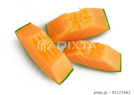 Cantaloupe melon slices isolated on white background with full depth of field. Top view. Flat lay Cantaloupe melon slices isolated on white background with full depth of field. Top view. Flat lay 93125962