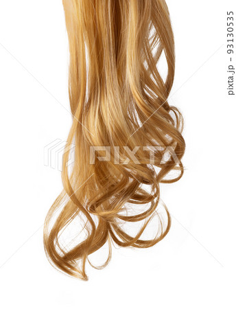 Long golden blond curly hair isolated on white background. A part of blond hair for design. Long golden blond curly hair isolated on white background. A part of blond hair for design. 93130535