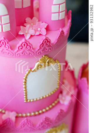 the pink cake in the form of a fairytale castle. the pink cake in the form of a fairytale castle. 93132962