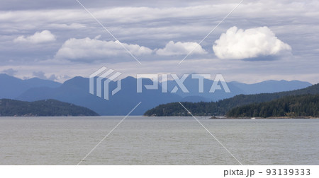 Howe Sound, Islands and Canadian Mountain Landscape Background. Howe Sound, Islands and Canadian Mountain Landscape Background. 93139333