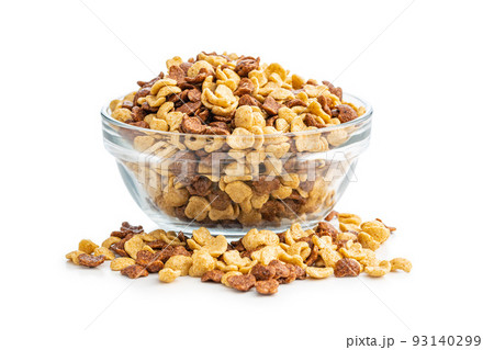 Breakfast cereal flakes in bowl isolated on white background. 93140299
