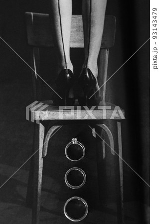 Three wedding rings under the chair. Wedding day Three wedding rings under the chair. Wedding day 93143479