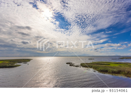 DREVERNA, LITHUANIA - AUG 08, 2022: Aerial View from the tower of Dreverna harbour. Dreverna is a village located on the Dreverna river, southwest of the village is the Curonian Lagoon. 93154061