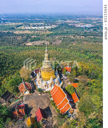 Aerial view of Wat Phra Phutthabat Tak Pha temple on top of the mountain in Lamphun, Thailand Aerial view of Wat Phra Phutthabat Tak Pha temple on top of the mountain in Lamphun, Thailand 93155045