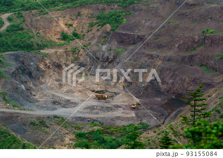 small quarry with mining machinery in mountainous area small quarry with mining machinery in mountainous area 93155084