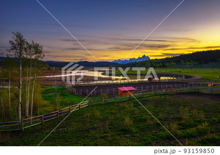 Sunset above the Grand Teton Mountains and Buffalo Fork of the Snake River Sunset above the Grand Teton Mountains and Buffalo Fork of the Snake River 93159850