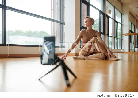 Talented Woman Filming Herself Performing 93159917