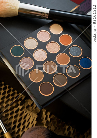 fashion set of new cosmetics palette with brushes. close up fashion set of new cosmetics palette with brushes. close up 93161512