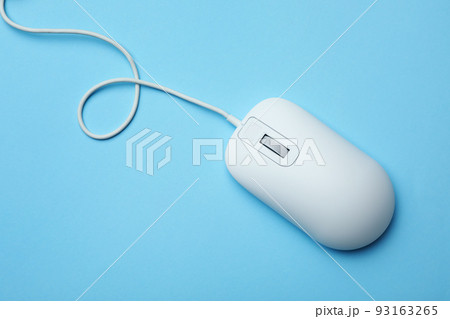 Wired computer mouse on light blue background, top view Wired computer mouse on light blue background, top view 93163265