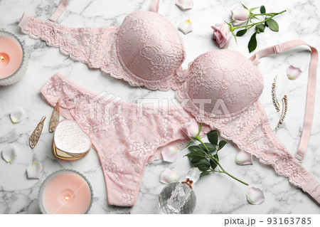 Flat lay composition with women's underwear on marble background 93163785