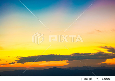 Colorful cumulus sunset sky clouds with sun setting down 93166601