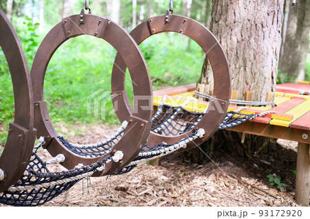 Rope park, obstacle course in the amusement park 93172920