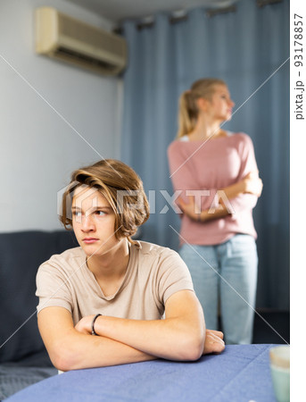 Portrait of unhappy son after discord with mother 93178857
