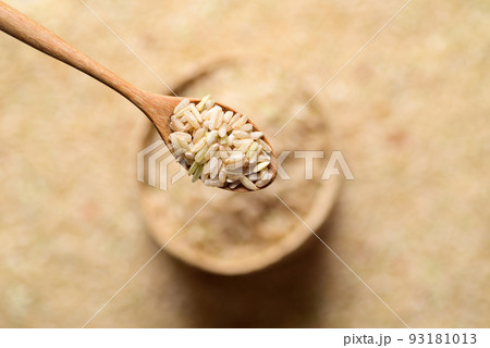 Thai brown rice seeds in spoon, Organic rice, Close up Thai brown rice seeds in spoon, Organic rice, Close up 93181013