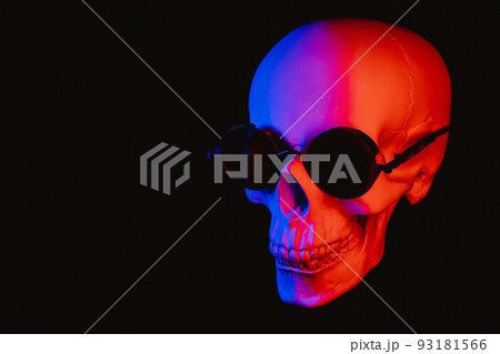 human skull wearing sunglasses with colored neon light human skull wearing sunglasses with colored neon light 93181566