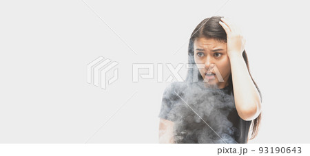Emotional young dark hair woman with different emotions isolated over white background with clouds of smoke. Concept of mental health, art, emotions 93190643