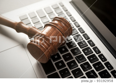 Cybercrime concept with gavel on laptop 93192958
