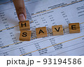 hand put word H replace for meaning of Have and Save. concept of money debt management. 93194586