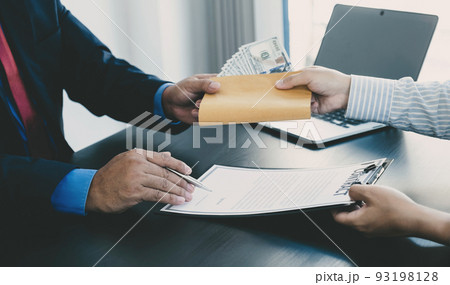 Government officials hand sign the contract and receiving bribe money from businessman, the concept of corruption and anti-bribery Government officials hand sign the contract and receiving bribe money from businessman, the concept of corruption and anti-bribery 93198128