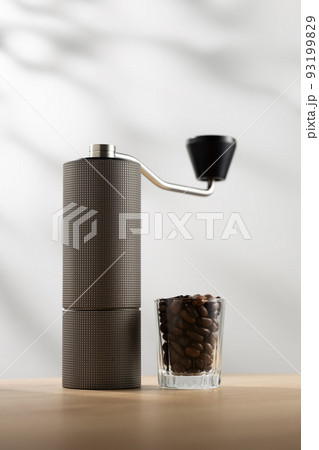 Manual coffee grinder and dark roast coffee beans Manual coffee grinder and dark roast coffee beans 93199829