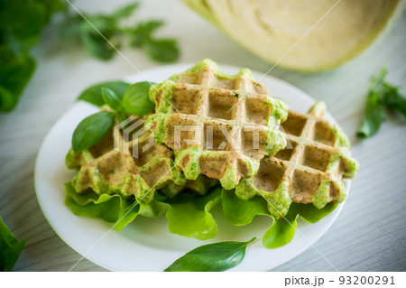 vegetable waffles cooked with herbs in a plate 93200291