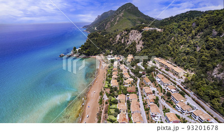 Greece summer holidays. Best scenic beaches of Corfu island - aerial panoramic view of Glyfada beach and village in western part 93201678