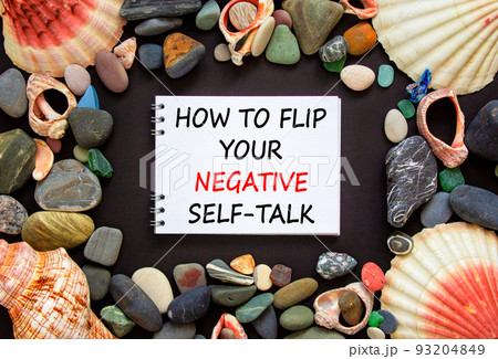 Flip negative self-talk symbol. Concept words How to flip your negative self-talk on beautiful black background. Sea stones and seashells. Psychological flip negative self-talk concept. Copy space. Flip negative self-talk symbol. Concept words How to flip your negative self-talk on beautiful black background. Sea stones and seashells. Psychological flip negative self-talk concept. Copy space. 93204849